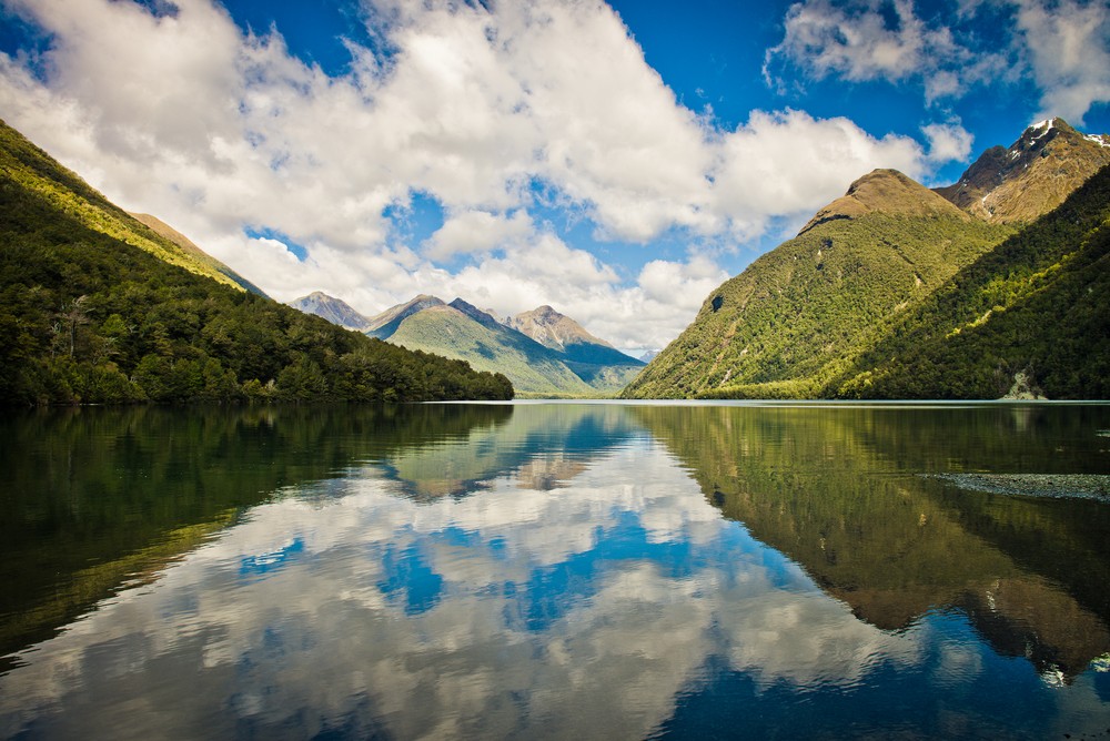 Lake Gunn reflections, Fiordland, New Zealand. Best Honeymoon Destinations